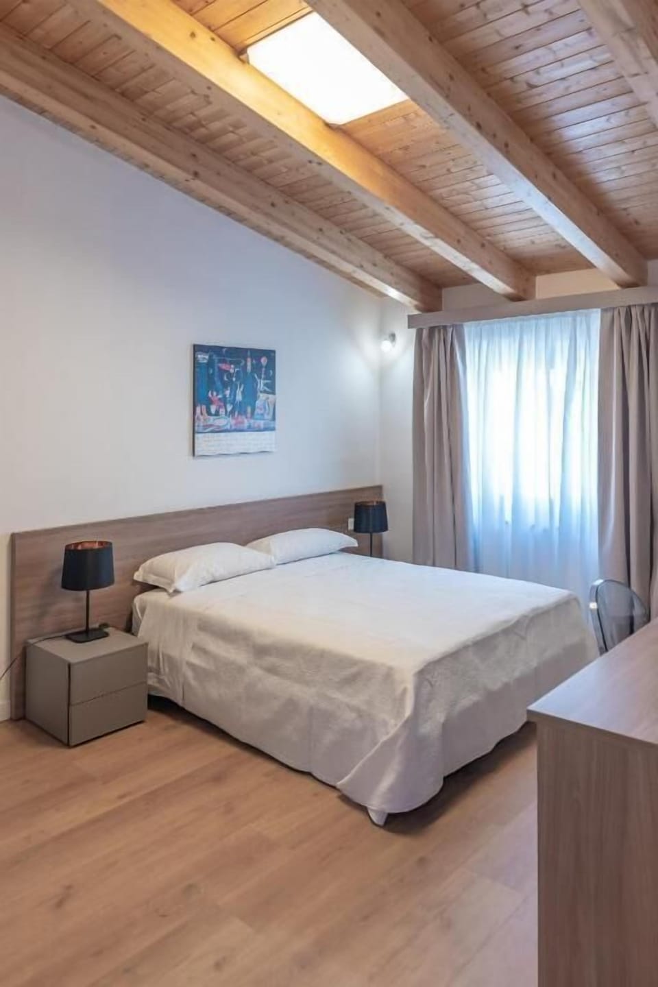 Superior Triple Room, Garden View | In-room safe, desk, soundproofing, iron/ironing board