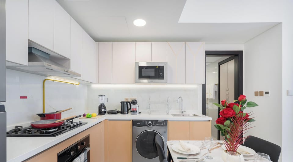 Deluxe Apartment, Balcony, City View | Private kitchen | Electric kettle, toaster, highchair, freezer