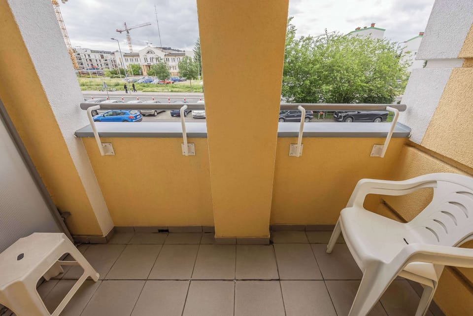 Private balcony with outdoor seating.