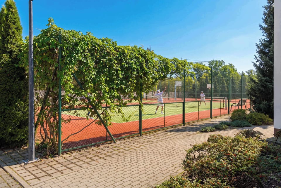 Tennis court within the residential complex.