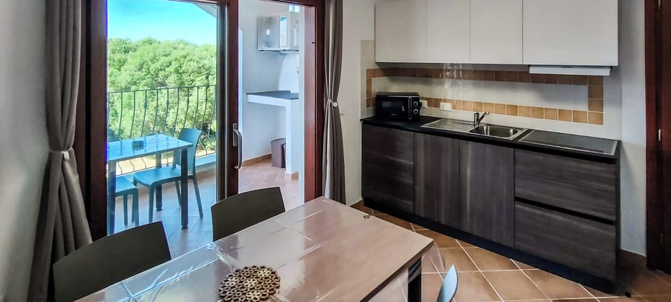 Apartment, Balcony, City View | Dining