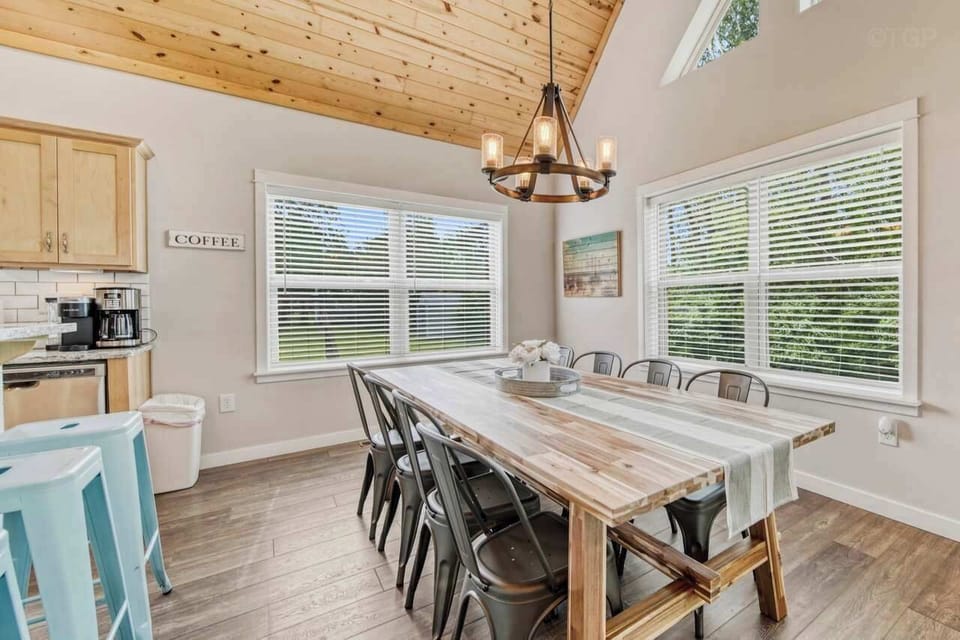 Dining table with seating for 6.  More seating at kitchen island