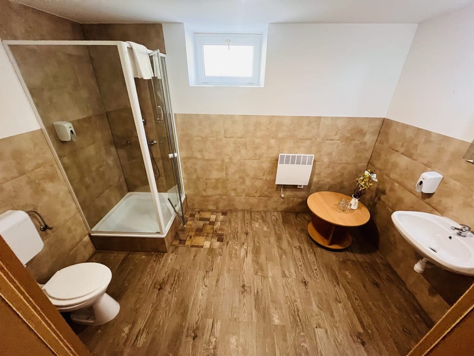 Classic Triple Room, Courtyard View | Bathroom | Shower, towels, toilet paper