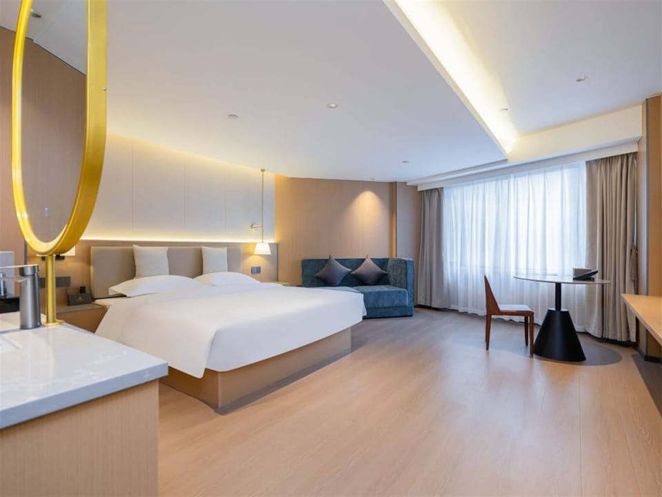 Comfort Room | Laptop workspace, iron/ironing board, WiFi (free), bed sheets