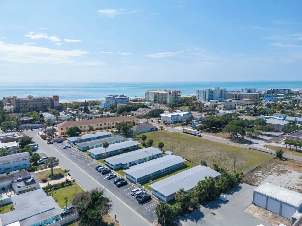 Aerial view — steps from the beach, close to everything