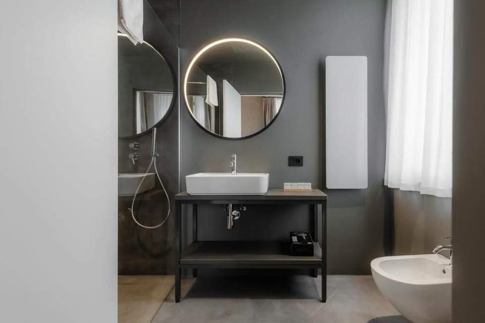 Deluxe Double Room, Hill View | Bathroom | Shower, eco-friendly toiletries, hair dryer, slippers