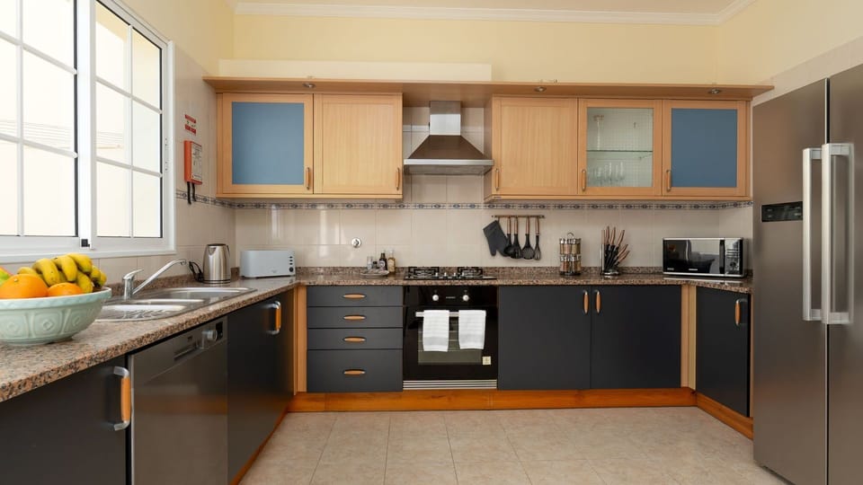 Fully equipped kitchen with plenty of space to cook, dine, and feel at home during your stay. 
#KitchenSpace #HomeAwayFromHome #TravelComfort #MadeiraStay #Lovelystay