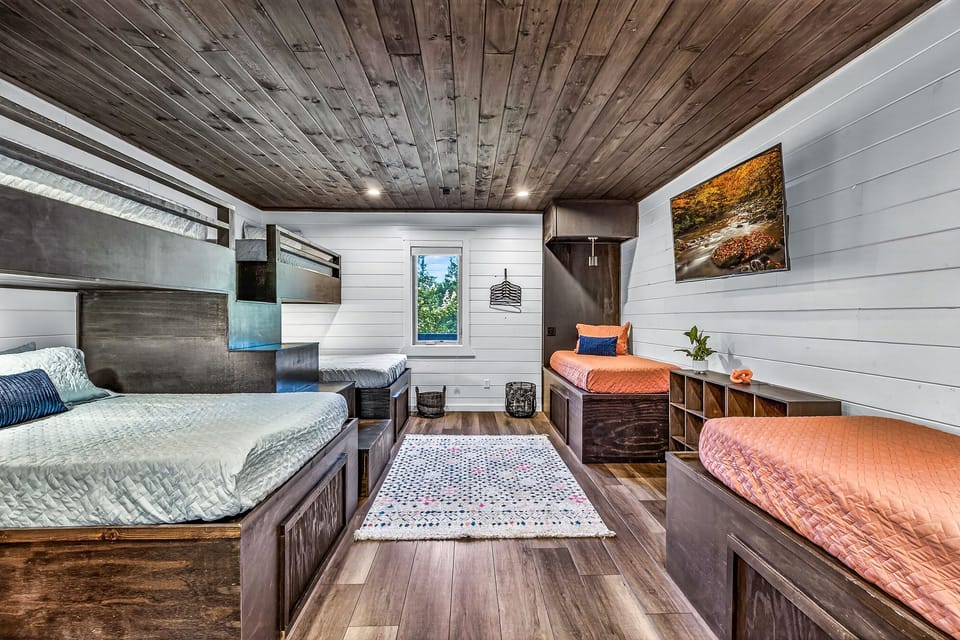 Perfect for families or groups, this bedroom offers comfortable sleeping space for all.