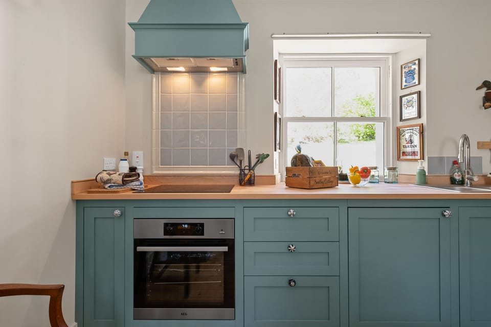 This charming kitchen blends modern convenience with classic country style.
