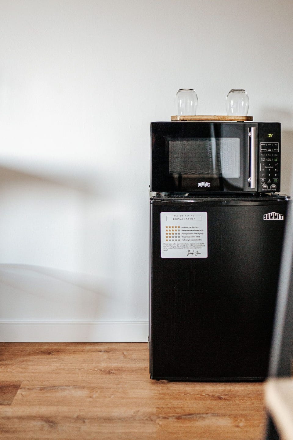 The kitchenette features sleek appliances, perfect for quick meals and snacks during your stay.