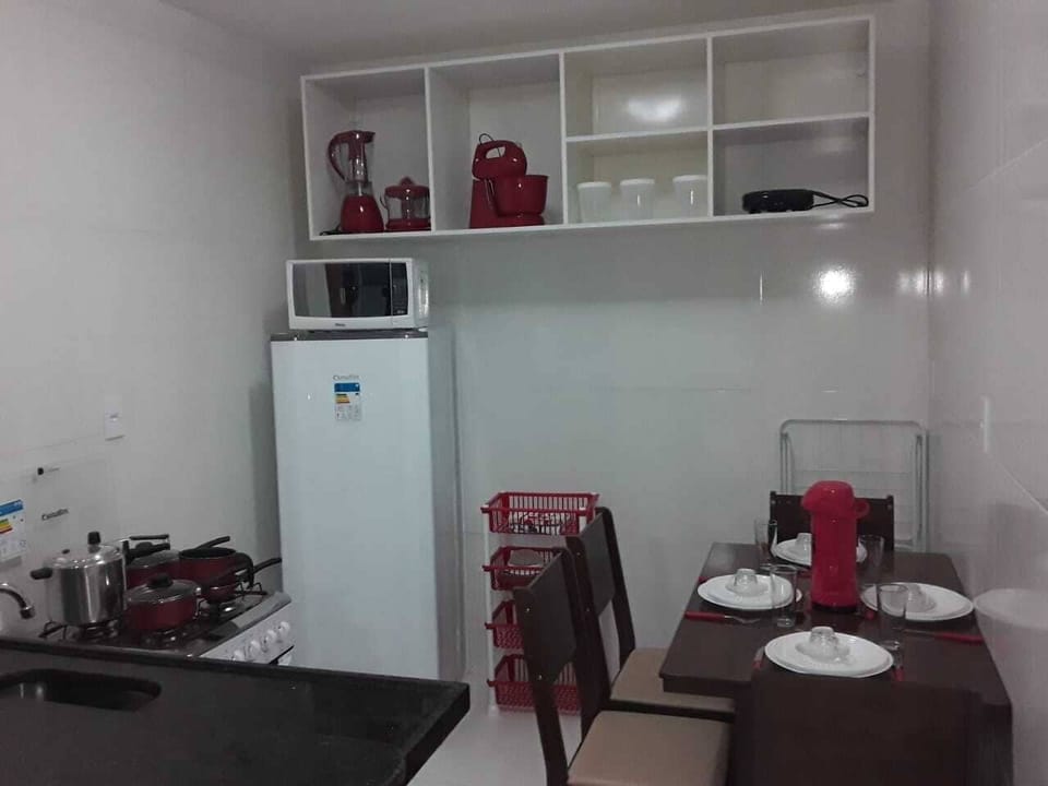 Fridge, microwave, cookware/dishes/utensils