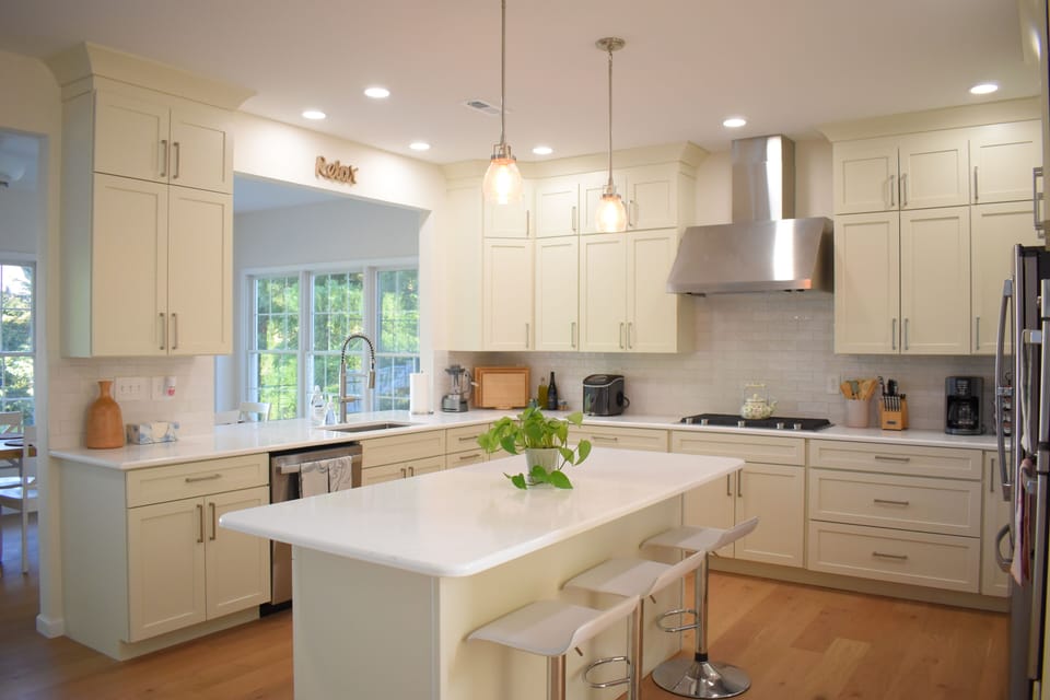 Bright chef’s kitchen with large island seating and elegant modern finishes