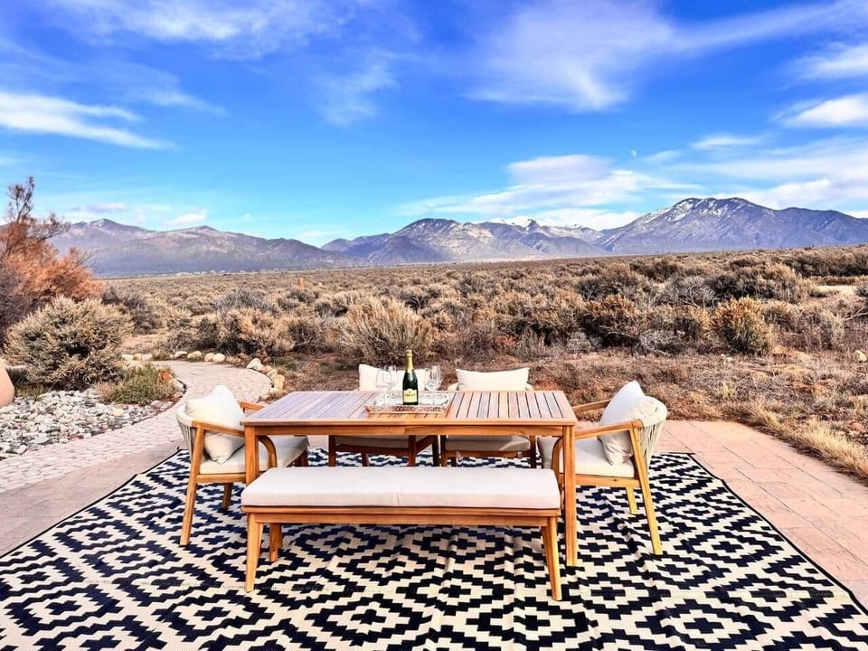 Outdoor dining with BBQ grill and breathtaking mountain views