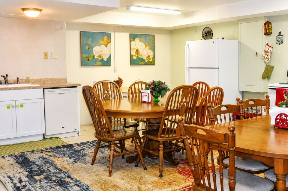 This lower-level kitchen may remind you of a classic church supper or community gathering space — warm, functional, and ready for family meals.