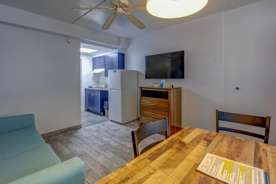 Suite, Multiple Beds, Kitchenette (Smoke Free, Two Rooms, Efficiency) | Living area | 43-inch flat-screen TV with cable channels, TV