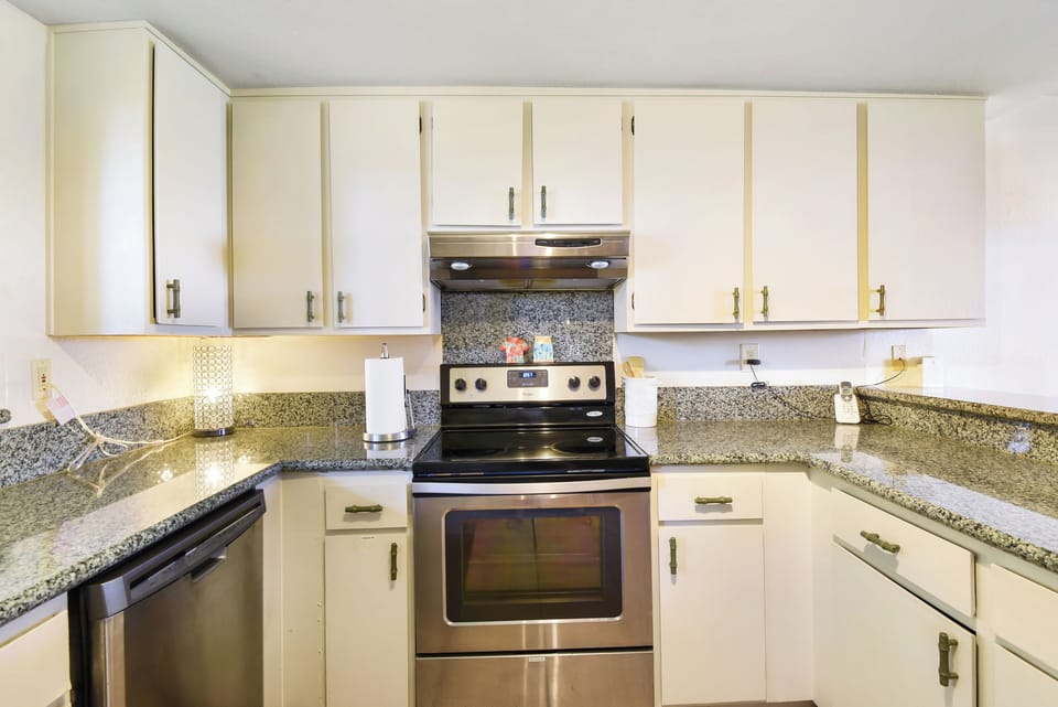 Kitchen has ample counter space and most everything you will need to feel at home.