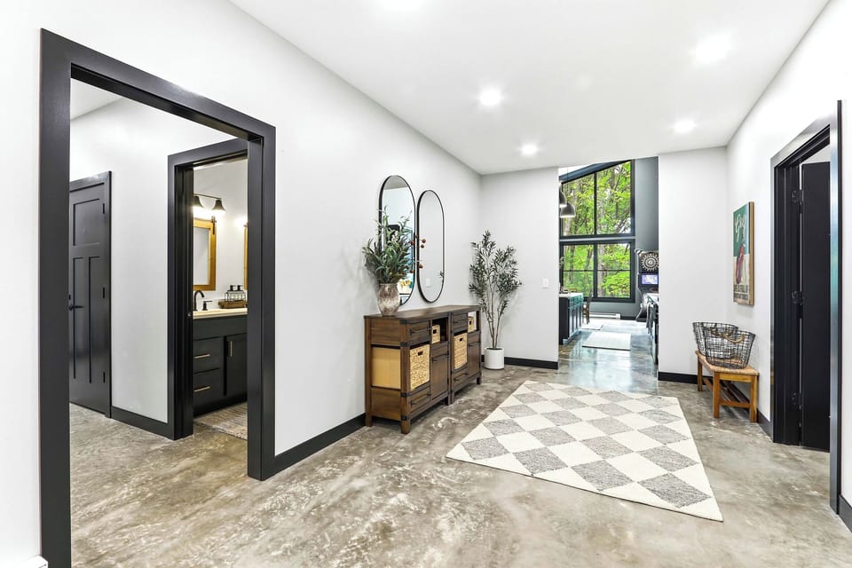 Step into a polished entryway with thoughtful design touches and an easy flow that welcomes you straight into the heart of the home.