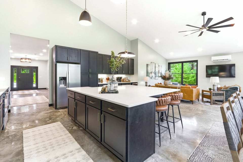 Move seamlessly from cooking to lounging in a bright, open-concept space designed for easy gatherings, cozy downtime, and effortless connection.