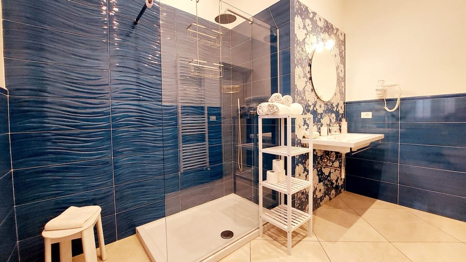 Deluxe Double or Twin Room, Balcony, Mountain View | Bathroom | Free toiletries, hair dryer, bidet, towels