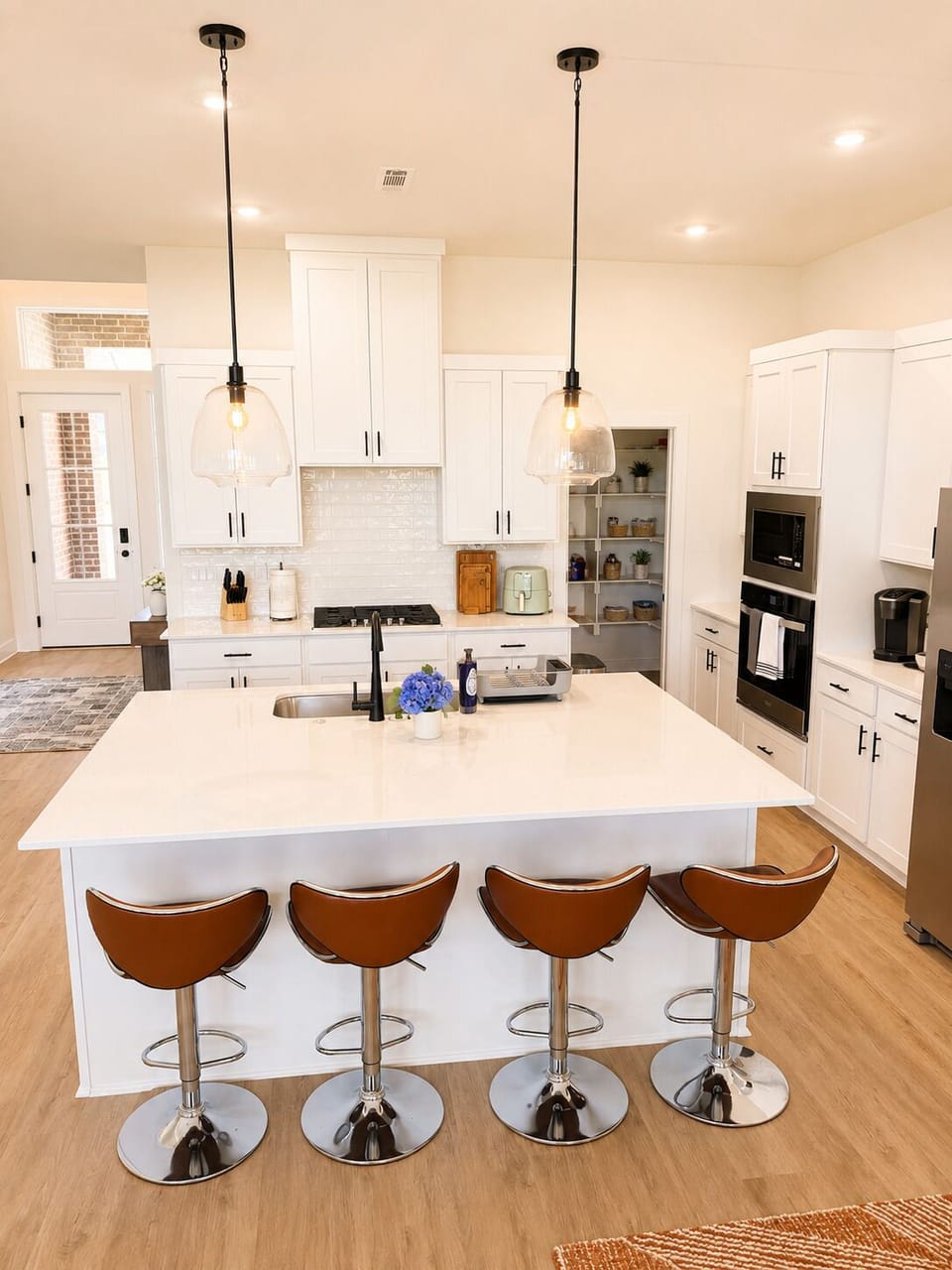 Bright modern kitchen with large island seating for four