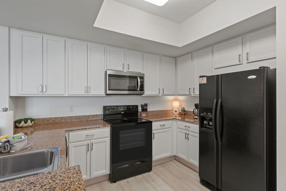 Bright kitchen perfect for coffee, meals, and beach days