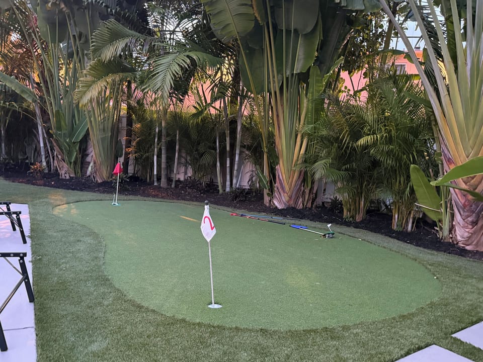 Private tropical putting green for fun, relaxation, and resort-style vibes