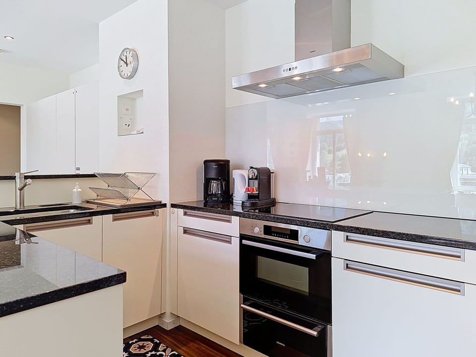 Kitchen Appliance, Kitchen, Countertop, Major Appliance, Interior Design, Flooring, Cabinetry, Kitchen Stove, Home Appliance, Stove