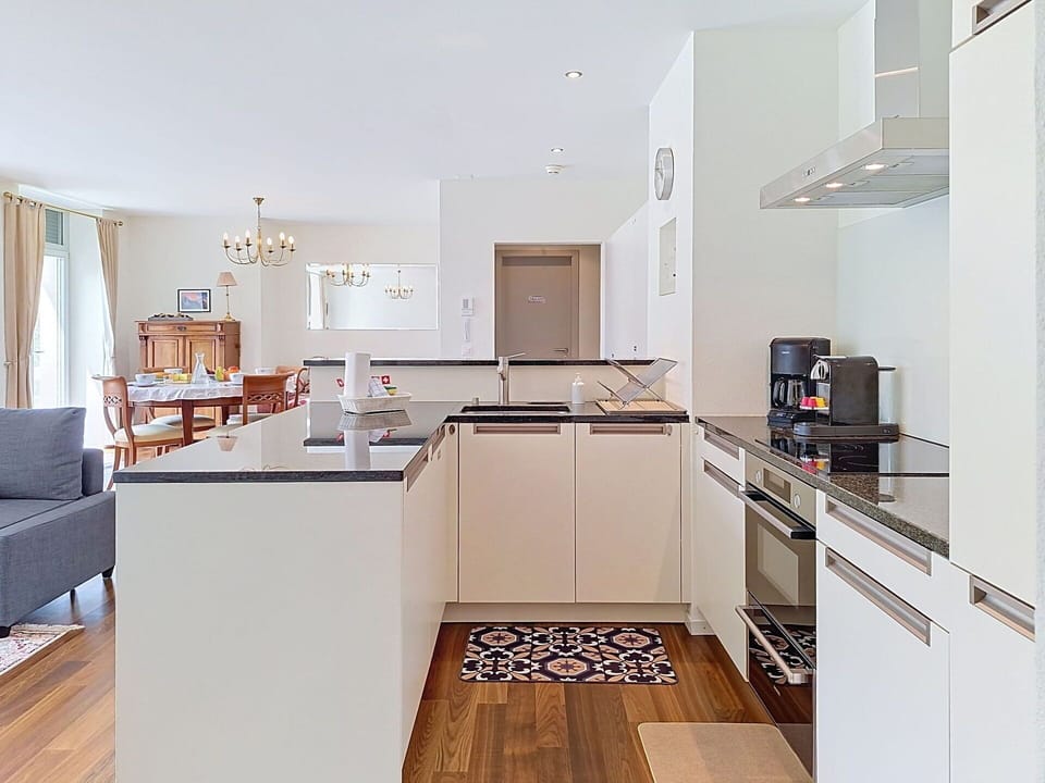 Kitchen, Countertop, Furniture, Kitchen Appliance, Interior Design, Flooring, Cabinetry, Floor, Wood, Ceiling