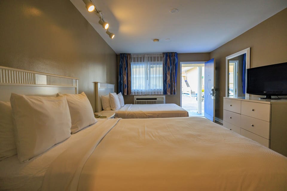 Standard Room, 2 Queen Beds | Iron/ironing board, bed sheets