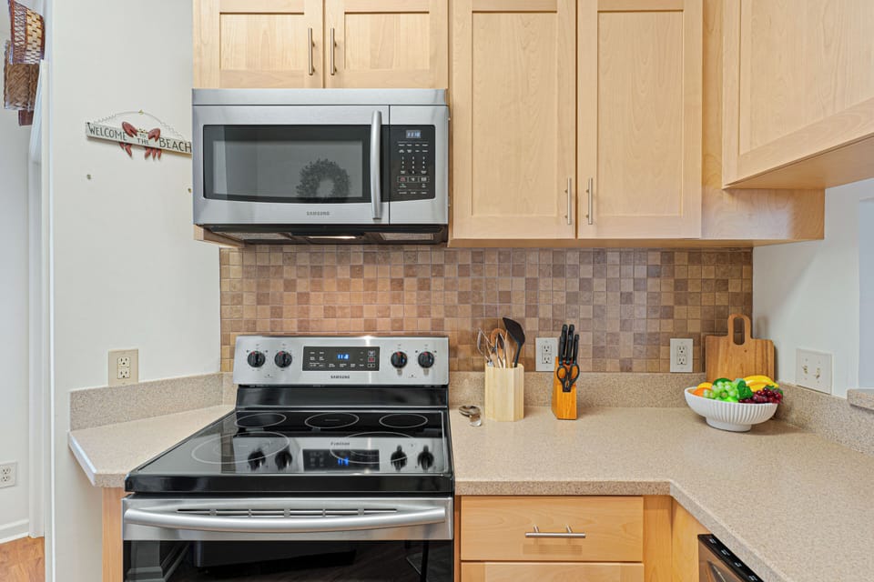 Fully stocked with cookware, dishes, and utensils