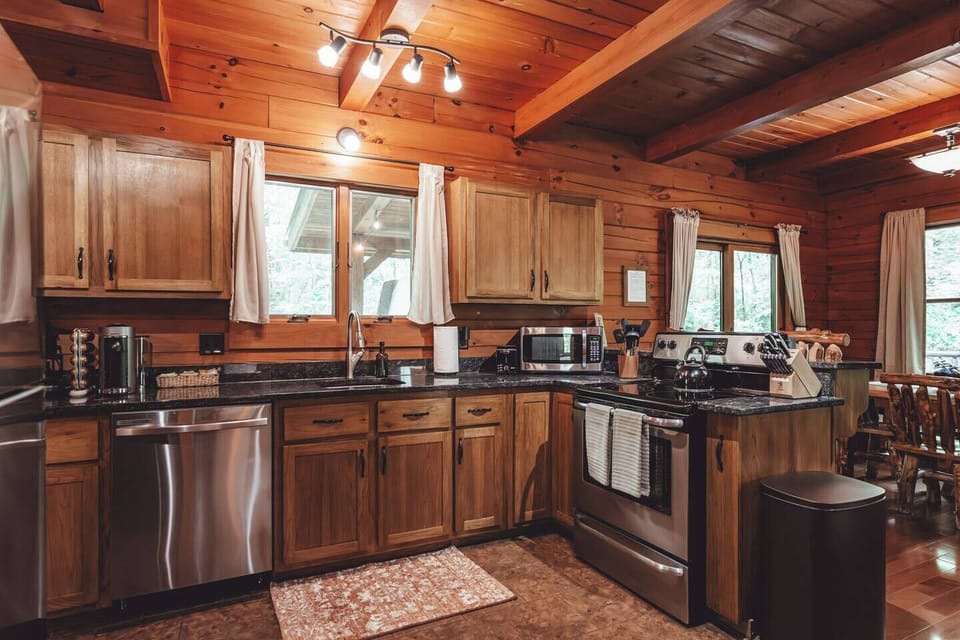 Full kitchen with stainless steel appliances