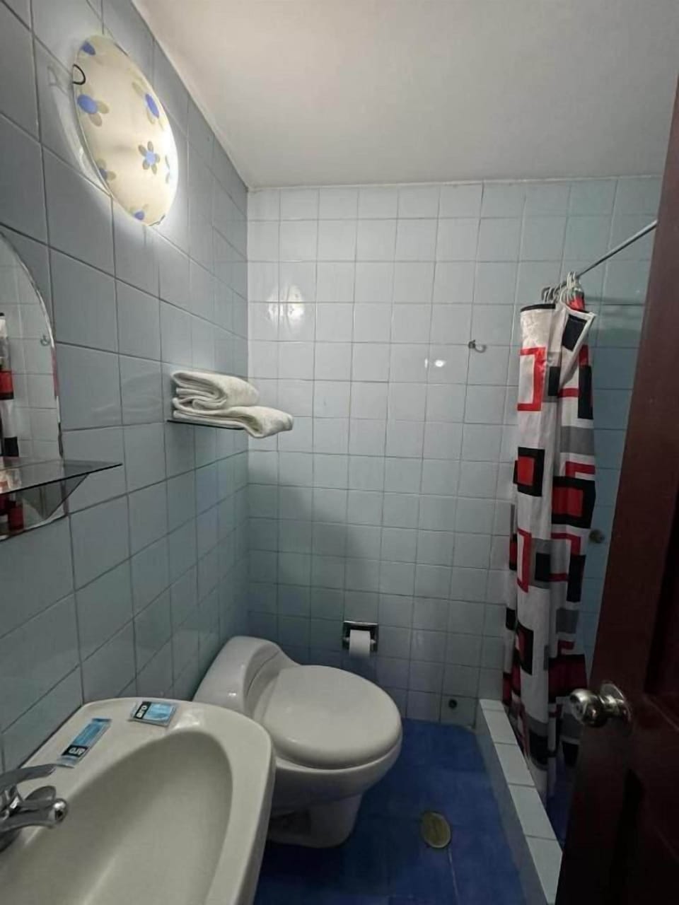Shower, towels, soap, toilet paper