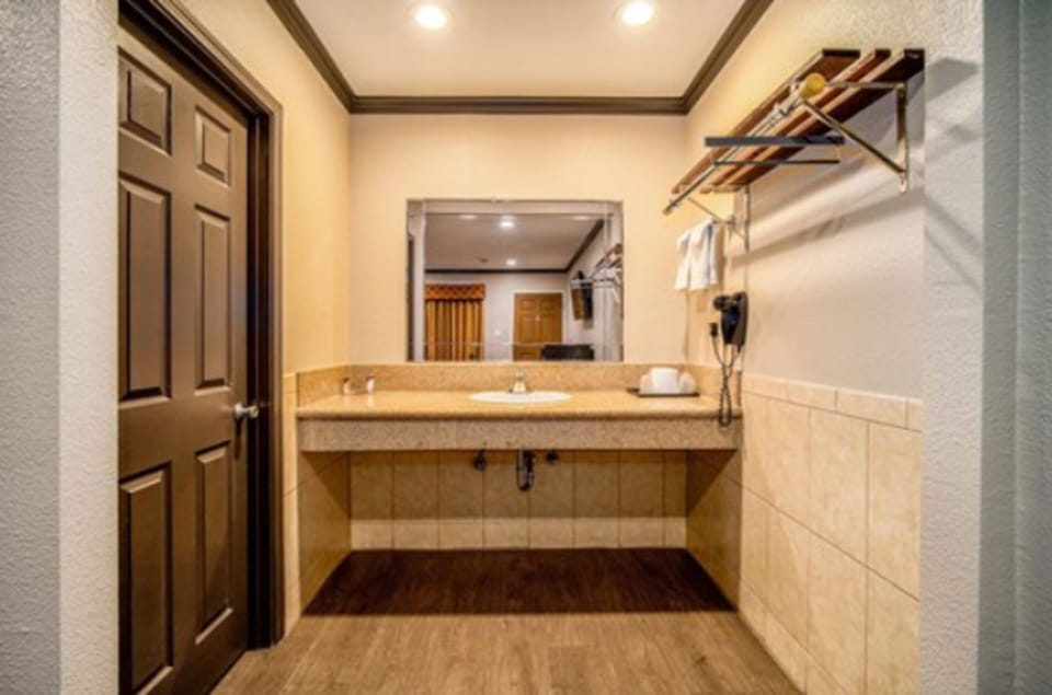 Combined shower/tub, hair dryer, towels, soap