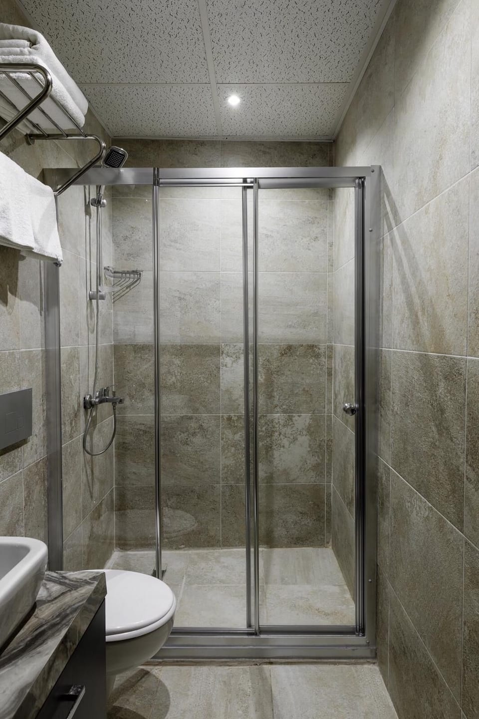 Shower, slippers, towels, soap