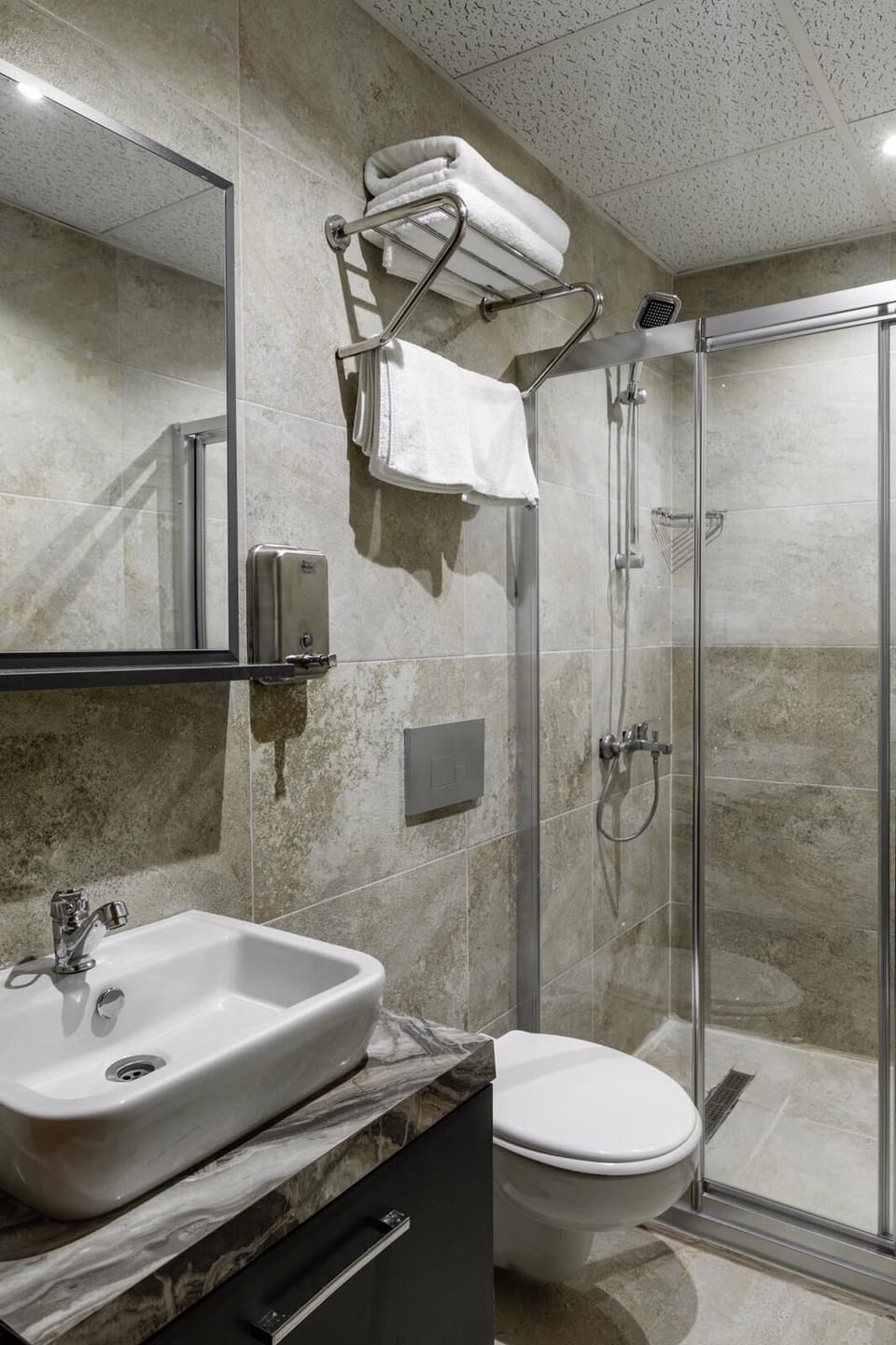Shower, slippers, towels, soap