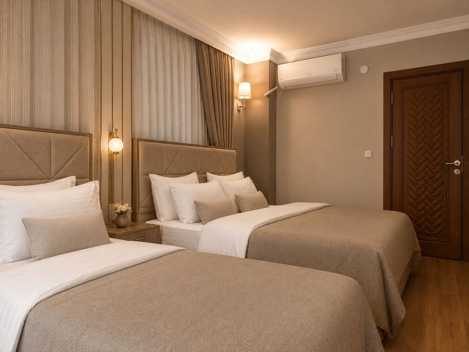 Comfort Triple Room, City View | In-room safe, desk, laptop workspace, iron/ironing board (on request)