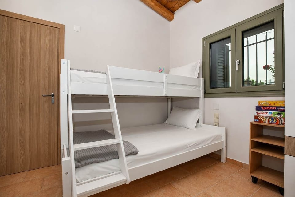 Bunk bedroom thoughtfully arranged for families and younger guests.
