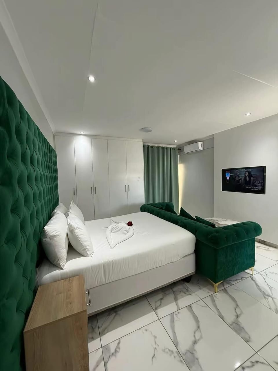 Premium bedding, desk, laptop workspace, iron/ironing board