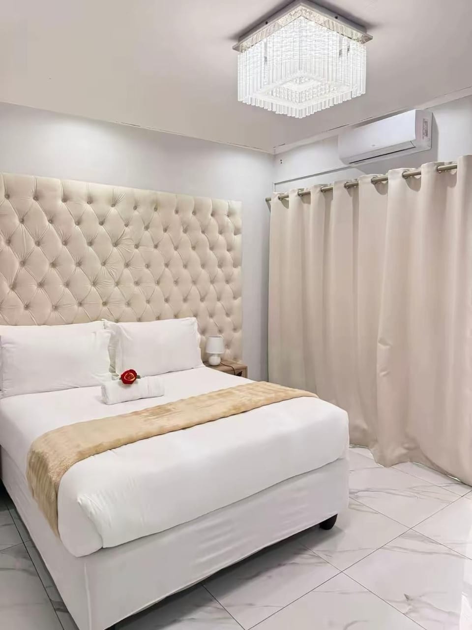 Premium bedding, desk, laptop workspace, iron/ironing board