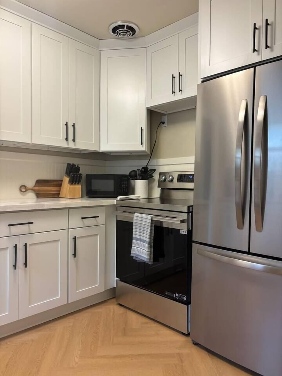 Recently updated Kitchen with all new appliances, quartz countertops, Keurig and drip coffee maker and kettle.  Some coffee, tea, and supplies to get you started.  