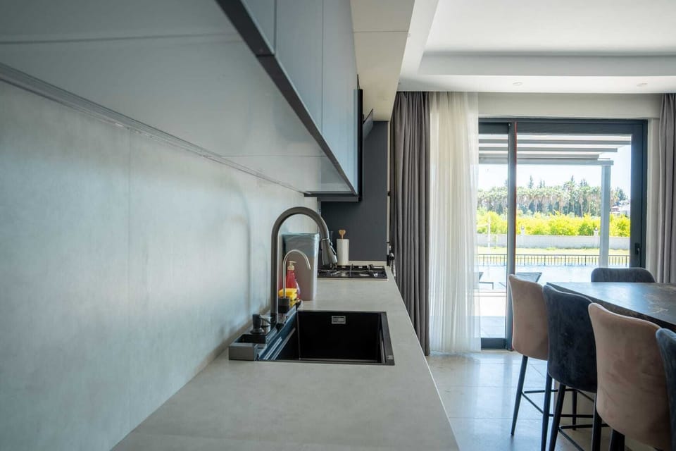 Villa | Private kitchen | Oven, stovetop, dishwasher, cookware/dishes/utensils