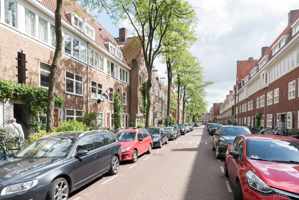 Experience authentic city living in a tree-lined street in the heart of Amsterdam.