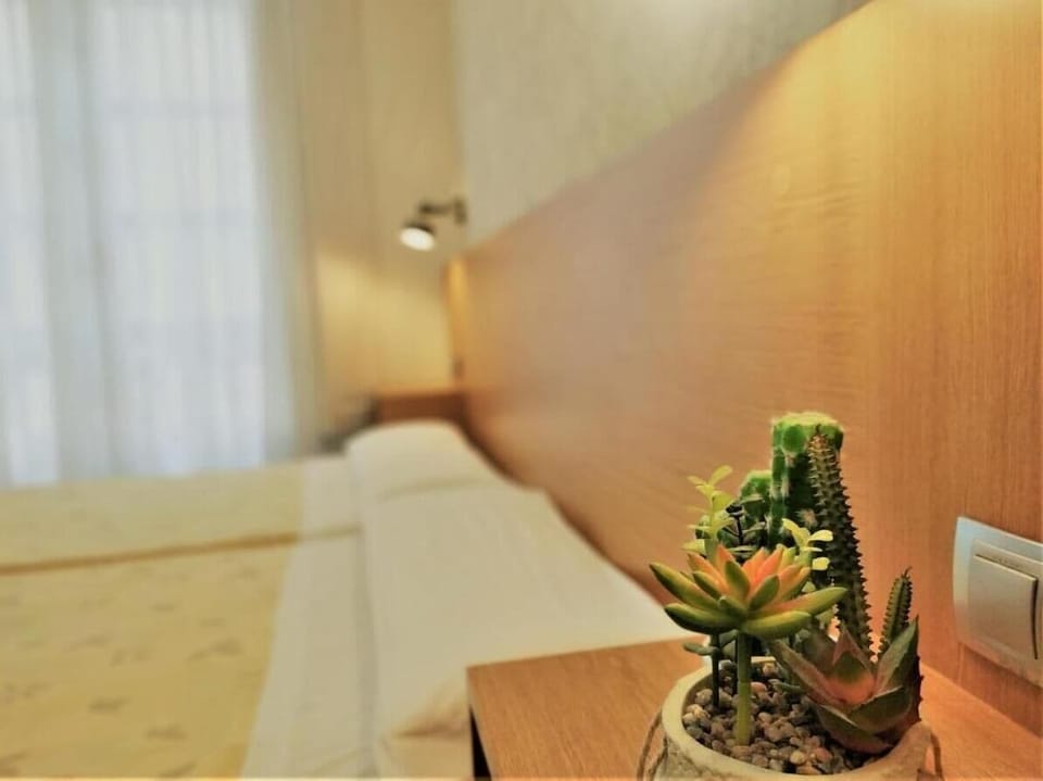 Quadruple Room | Down comforters, free WiFi, bed sheets