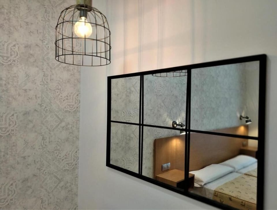 Quadruple Room | Down comforters, free WiFi, bed sheets