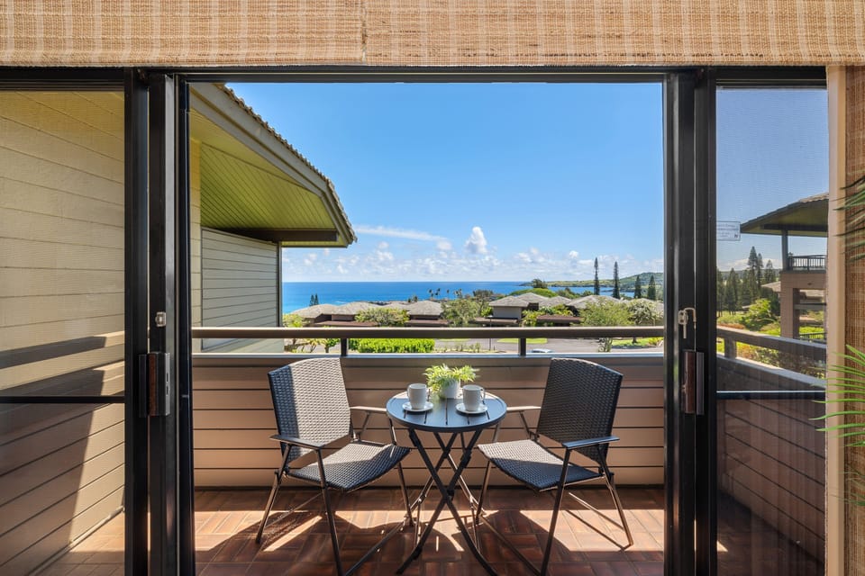 Enjoy ocean views right from inside with easy access to a private lanai and outdoor seating.