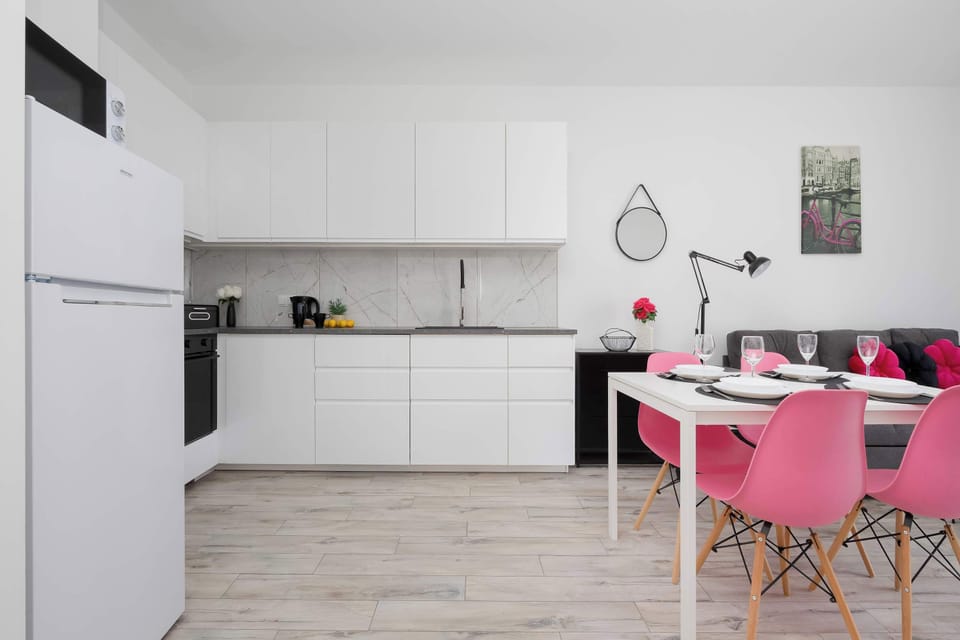 Wide view of the open-plan interior with a functional and modern layout.