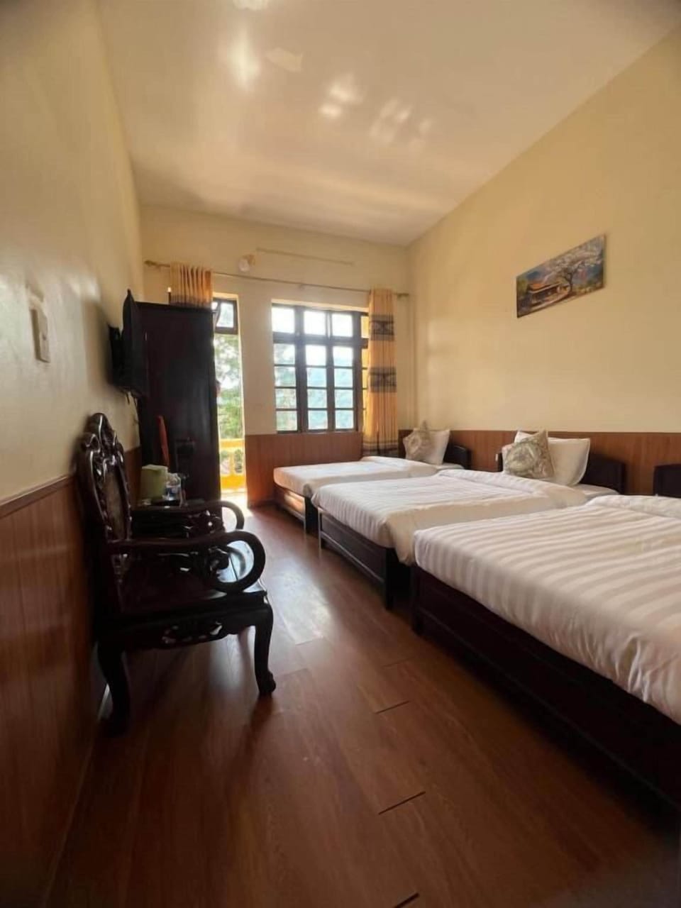 Deluxe Triple Room, Balcony, Garden View | Soundproofing, WiFi (free)