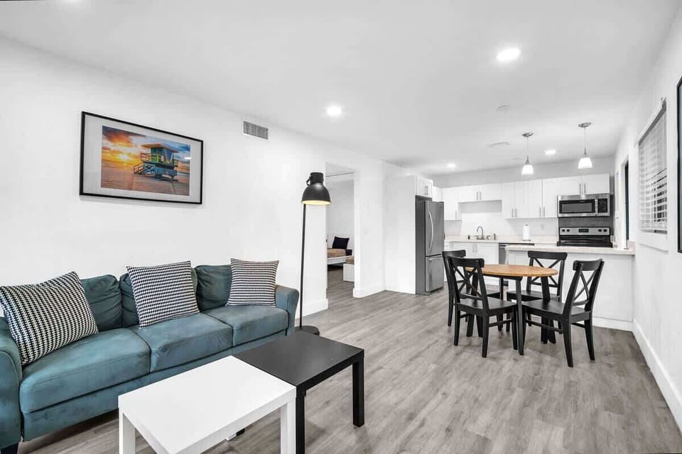 The open layout connects the living room, dining area, and kitchen, making it easy to gather and socialize.