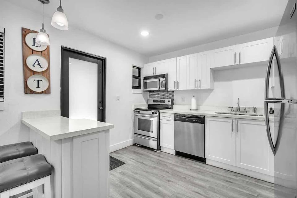 Spacious and functional kitchen with an open layout, making meal prep and gathering easy and enjoyable.