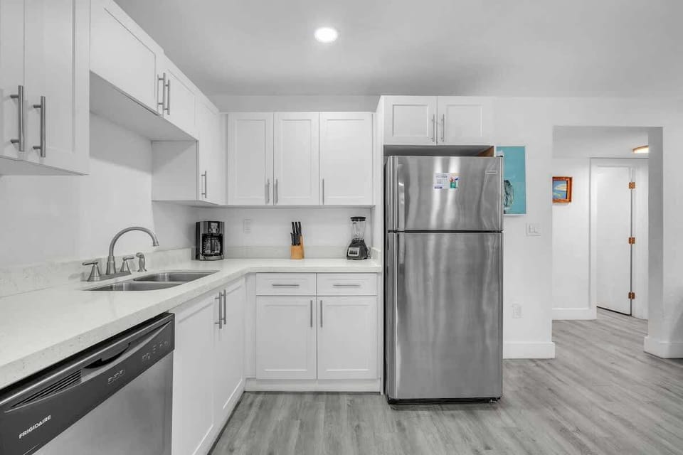 Fully equipped kitchen with ample cabinetry, generous counter space, and everything needed to prepare meals during your stay.
